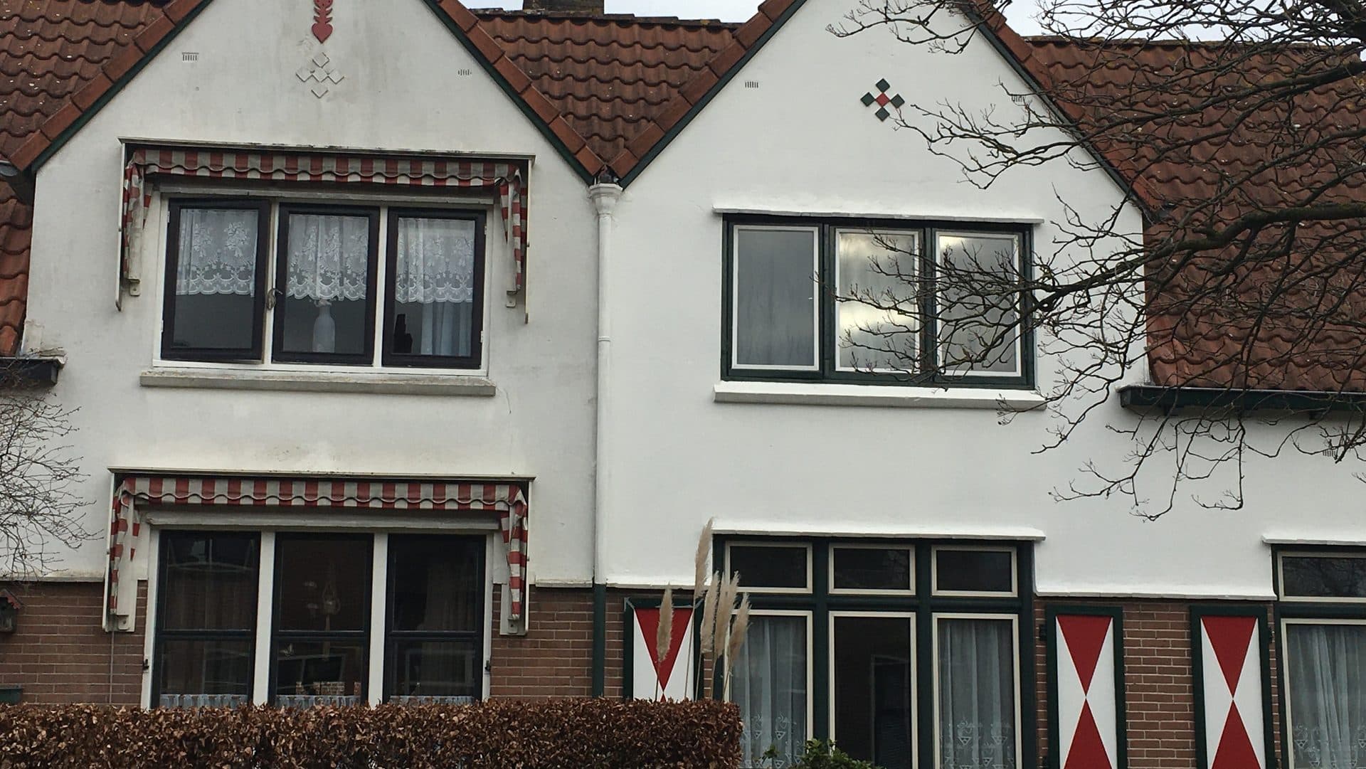 Huis schilderen met traditionele motieven