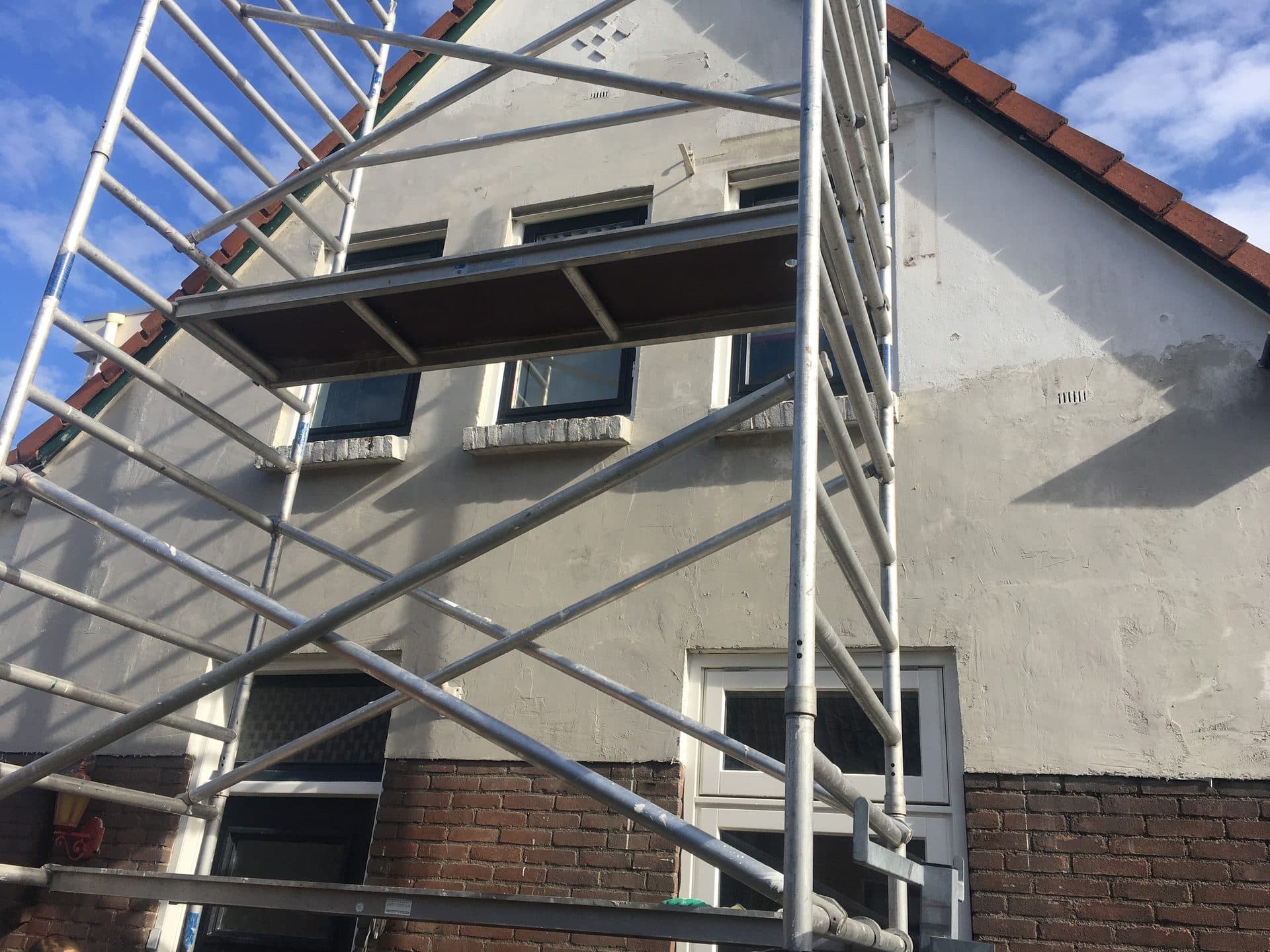 Buitenschilderwerk met hoogwerker